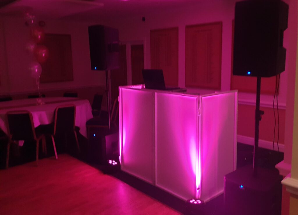 Wedding DJ booth and uplighting