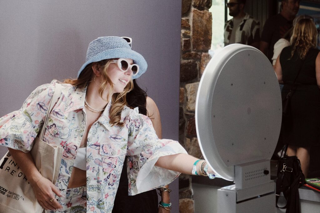 Woman using a photo pod